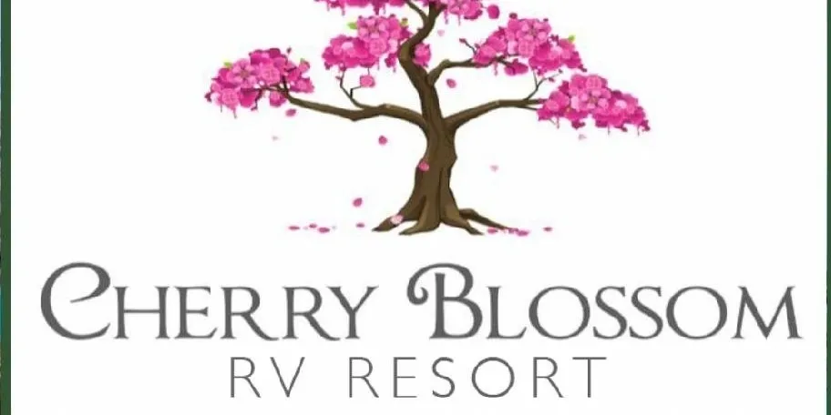 Logo of Cherry Blossom Luxury Resort with a pink flowering tree.